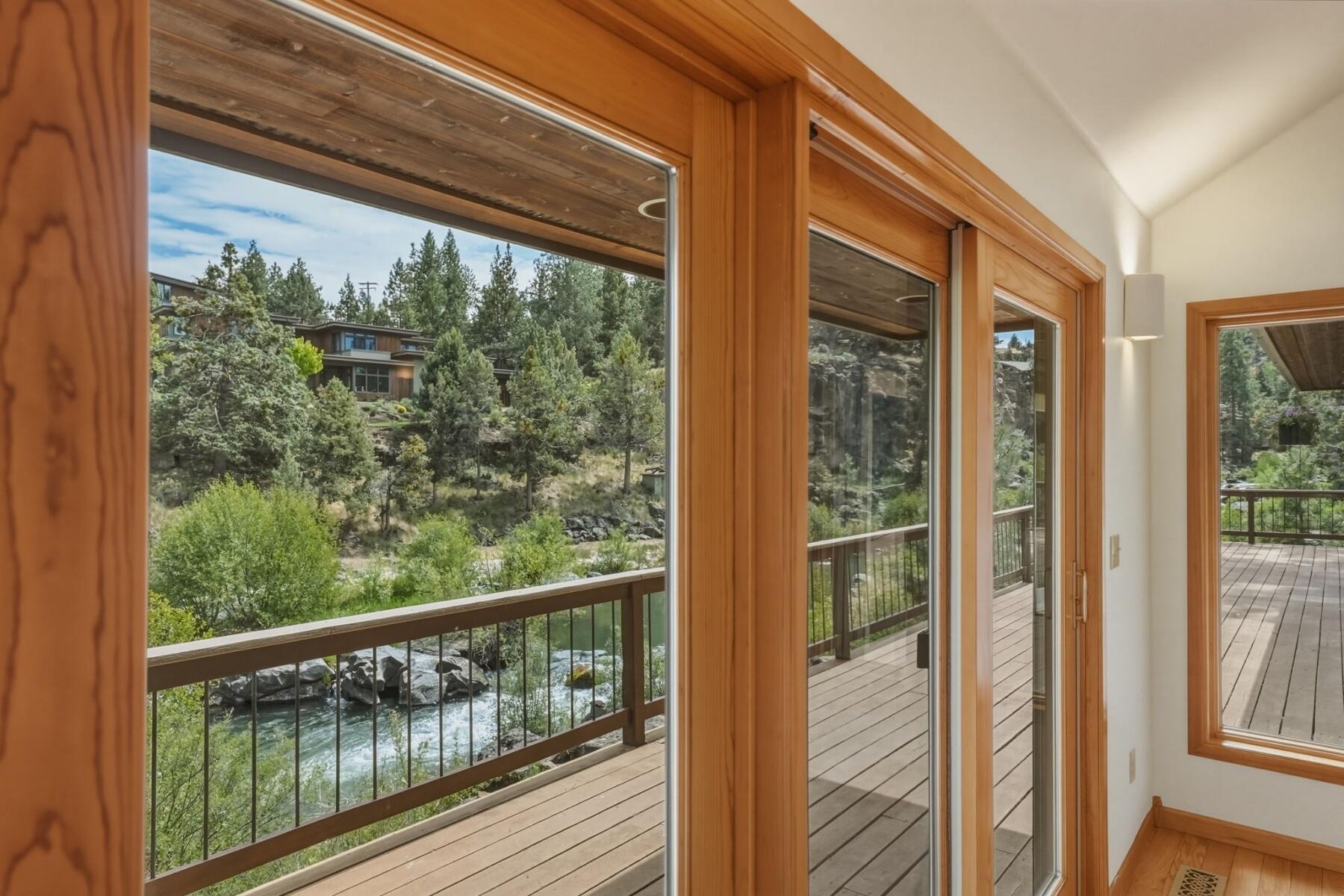 637 Northwest Silver Buckle Road Bend, OR 97703 - Photo 8 of 68 a view of a glass door with a balcony