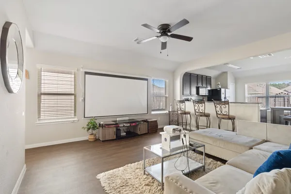 a living room with furniture and a window