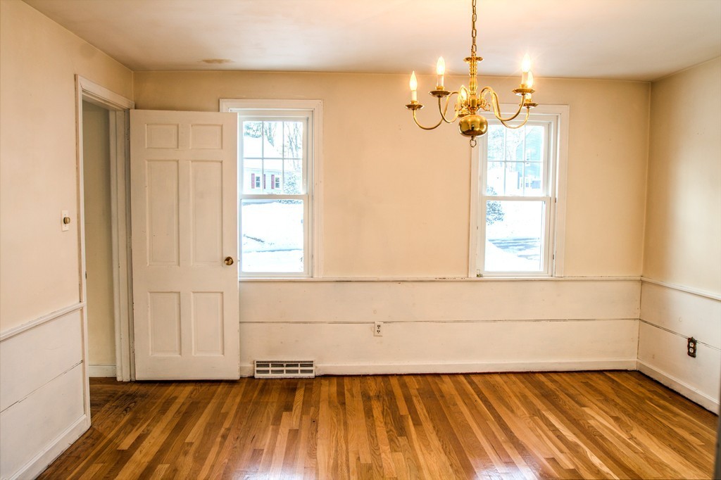 47 Amble Road Chelmsford, MA 01824 - Photo 6 of 30 a view of a room with wooden floor and a window