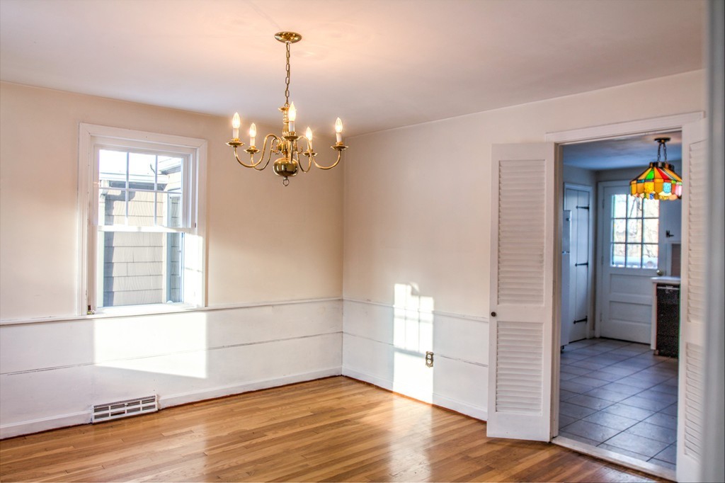 47 Amble Road Chelmsford, MA 01824 - Photo 7 of 30 a view of a room with wooden floor and window