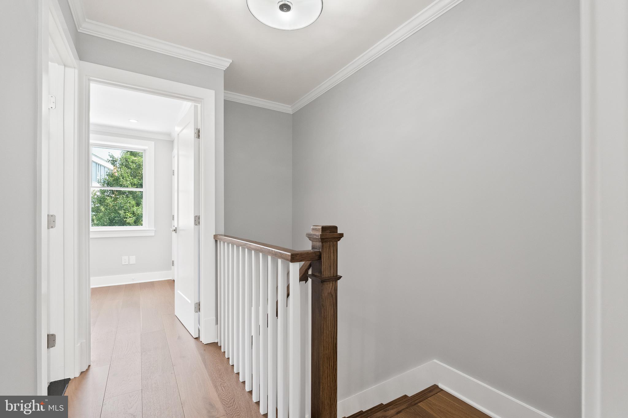 1841 E Street Northeast Washington, DC 20002 - Photo 24 of 50 a view of a hallway with wooden floor