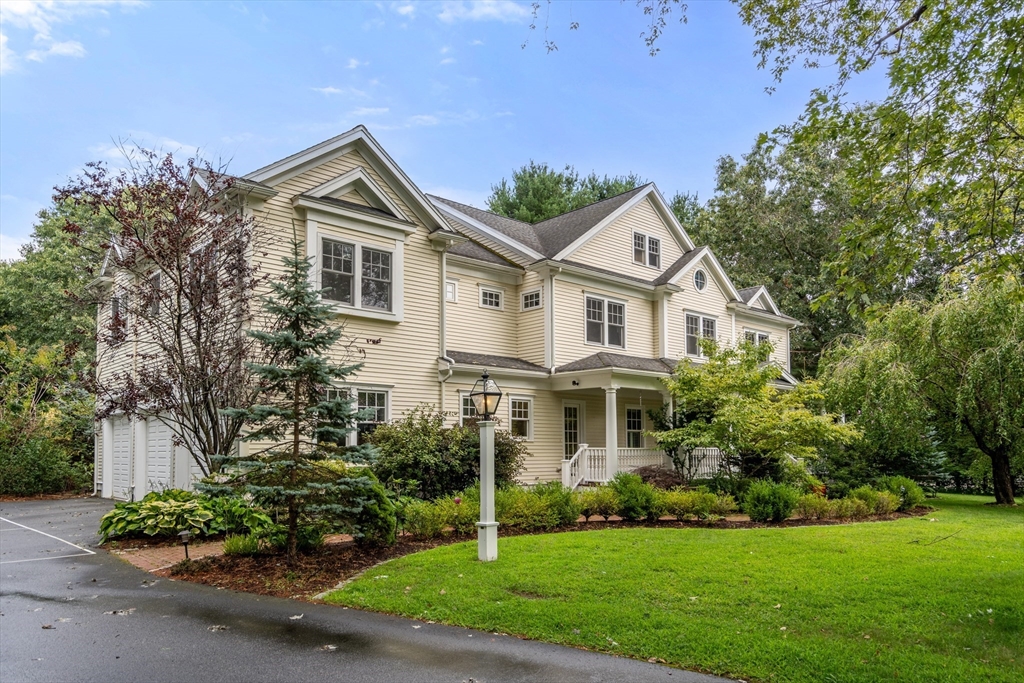 42 Victoria Road Sudbury, MA 01776 - Photo 1 of 42 a front view of a house with a yard