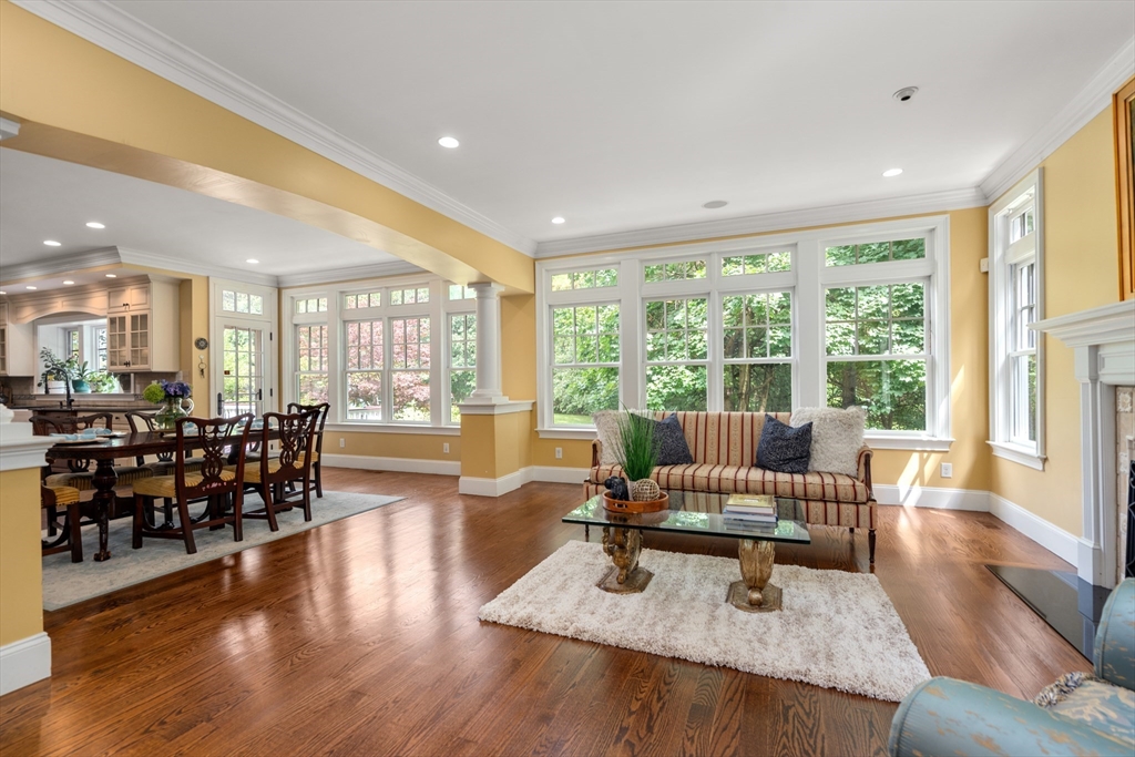 42 Victoria Road Sudbury, MA 01776 - Photo 12 of 42 a living room with furniture large window and wooden floor