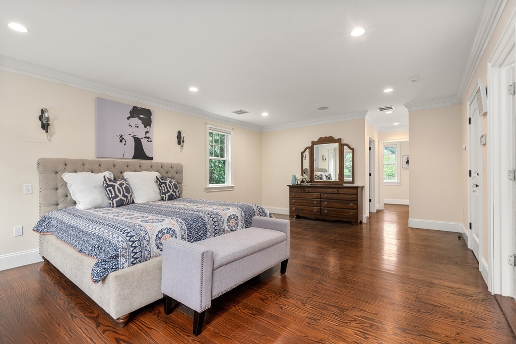 42 Victoria Road Sudbury, MA 01776 - Photo 20 of 42 a spacious bedroom with a bed a couch and dresser