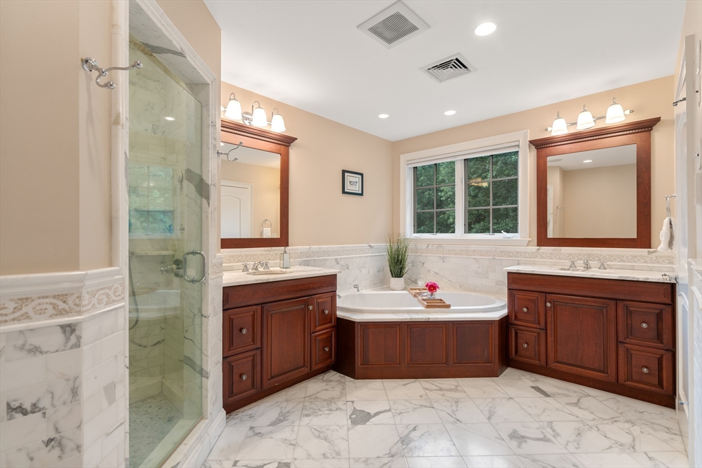 42 Victoria Road Sudbury, MA 01776 - Photo 22 of 42 a bathroom with a tub sink and mirror