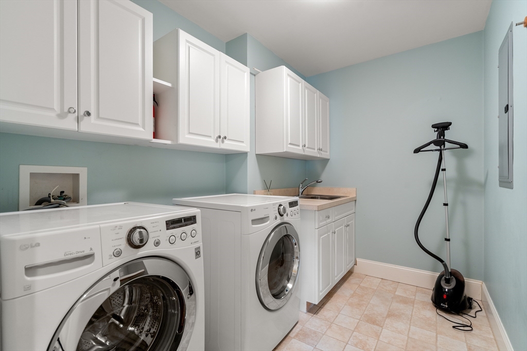 42 Victoria Road Sudbury, MA 01776 - Photo 27 of 42 a utility room with dryer and washer