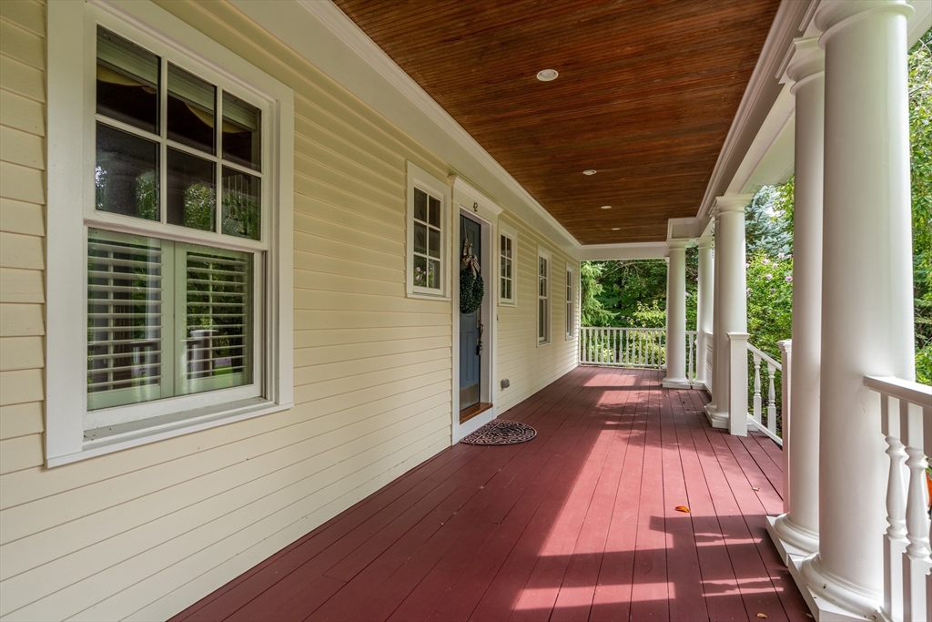 42 Victoria Road Sudbury, MA 01776 - Photo 39 of 42 a view of a house with a porch