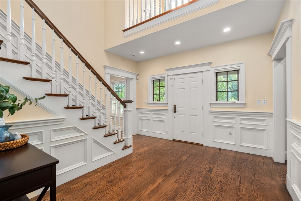 42 Victoria Road Sudbury, MA 01776 - Photo 6 of 42 a view of entryway and hall with wooden floor