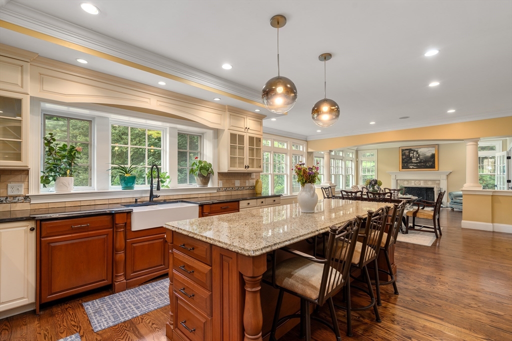 42 Victoria Road Sudbury, MA 01776 - Photo 10 of 42 a open kitchen with a table and chairs in it
