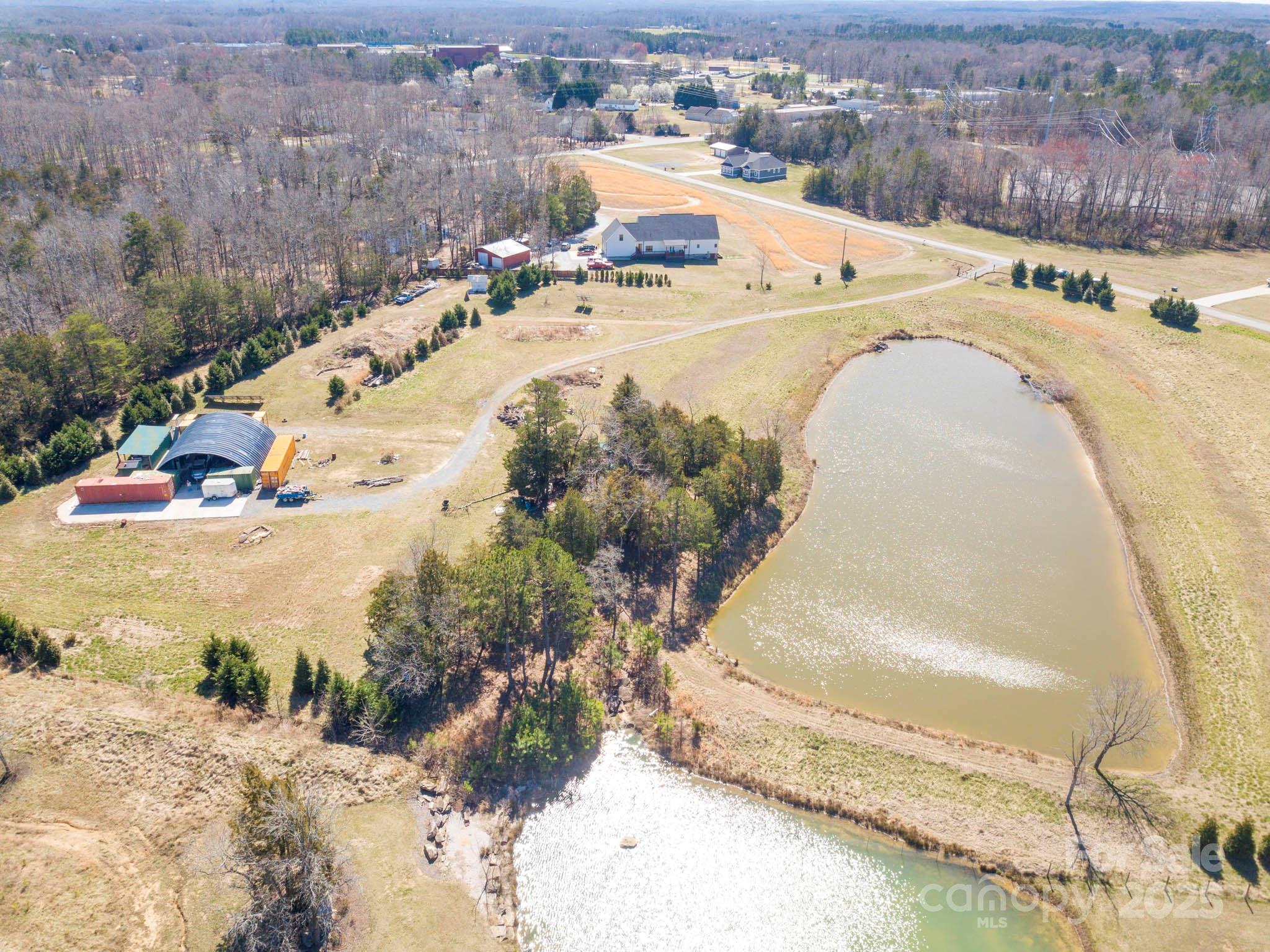 214 Currence Road Clover, SC 29710 - Photo 1 of 30 a view of a swimming pool with a yard