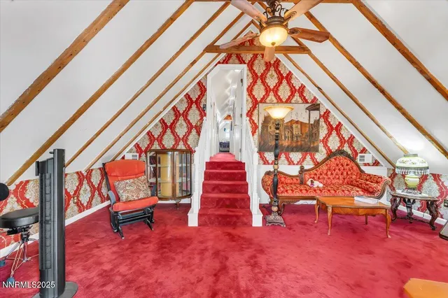 a view of a house with a flower garden