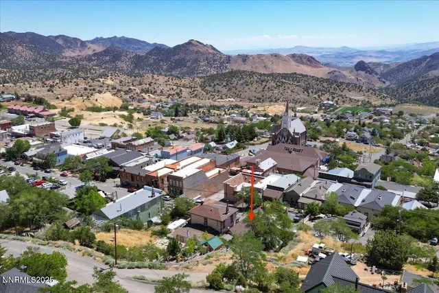 a room with a stove and a mirror