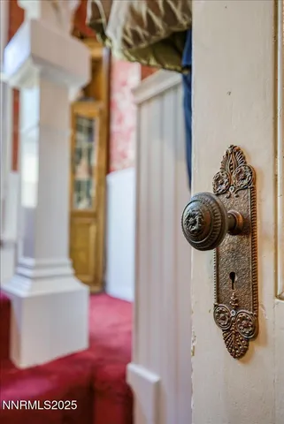 a view of a vase of flowers sitting on a table