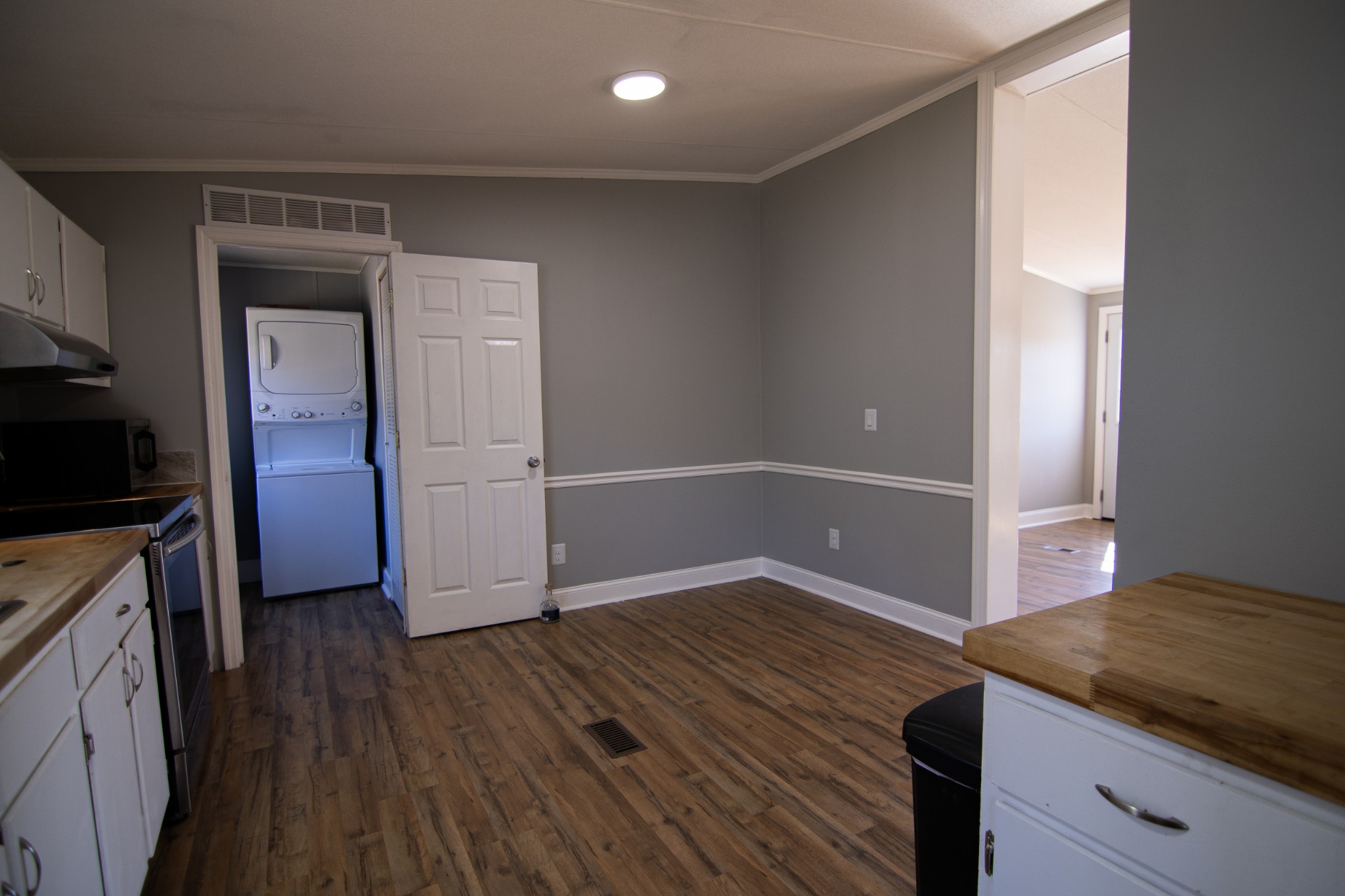 1712 John Sharp Road Spring Hill, TN 37174 - Photo 15 of 22 a view of a kitchen cabinets and wooden floor