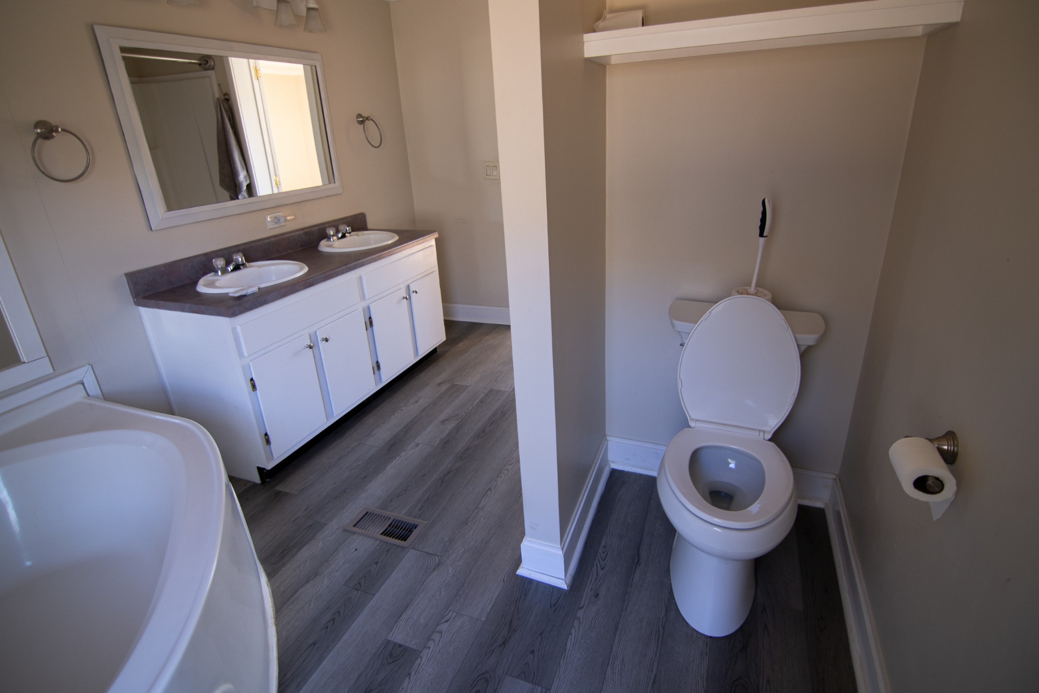 1712 John Sharp Road Spring Hill, TN 37174 - Photo 8 of 22 a bathroom with a granite countertop toilet sink and mirror