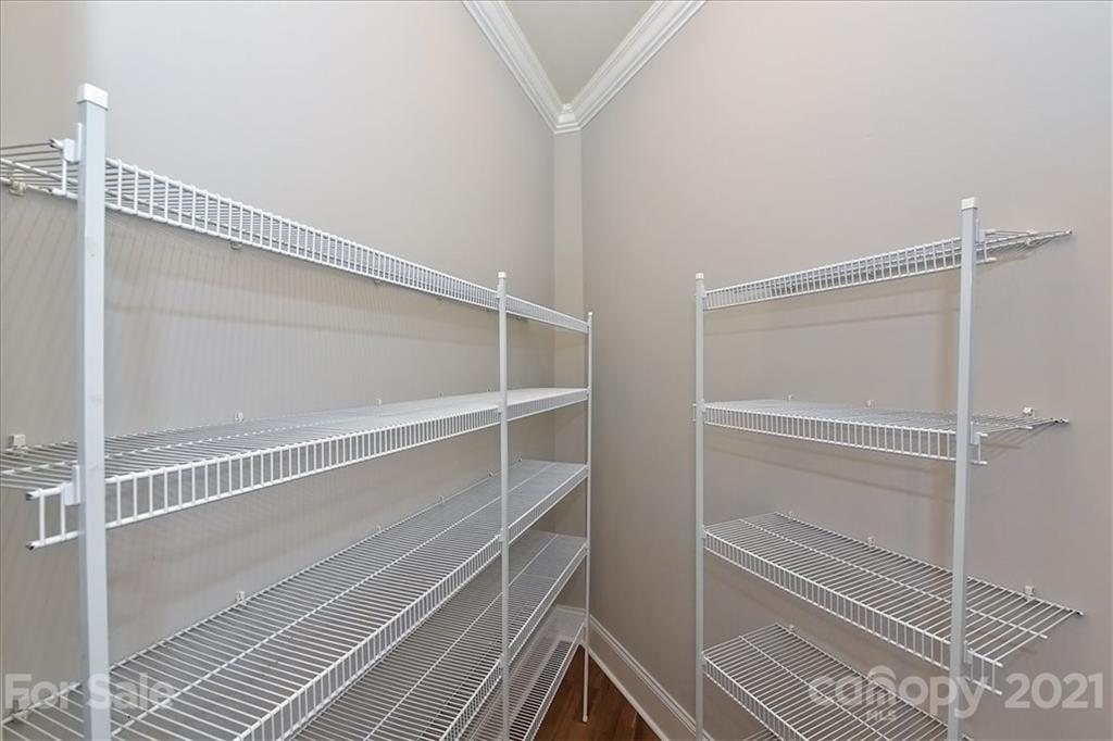 626 Queens Road, Unit 203 Charlotte, NC 28207 - Photo 30 of 48 a view of an empty walk in closet