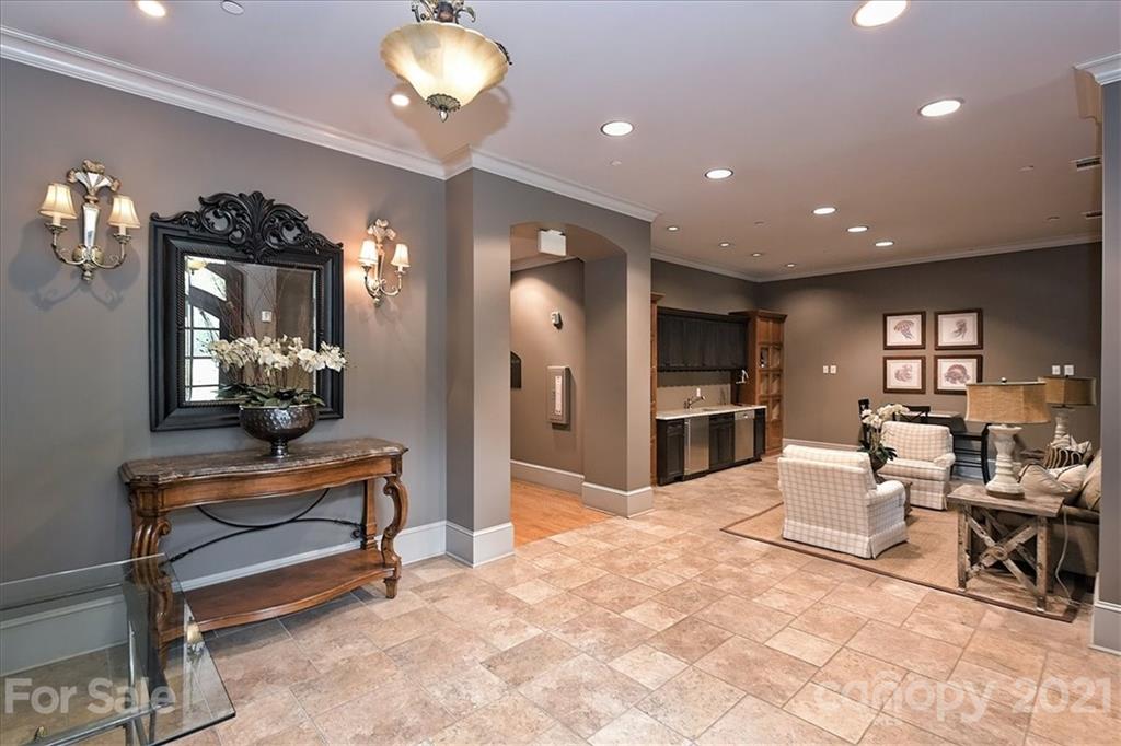 626 Queens Road, Unit 203 Charlotte, NC 28207 - Photo 4 of 48 a view of a living room and dining room