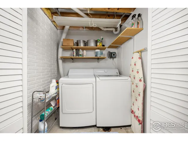 a view of a chairs and table in the garden