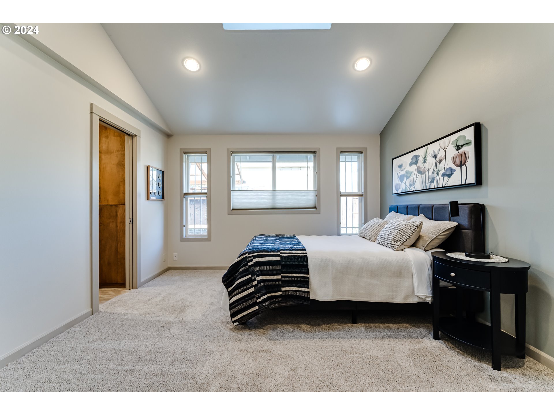 686 South 69th Place Springfield, OR 97478 - Photo 18 of 38 a bedroom with a bed and a window