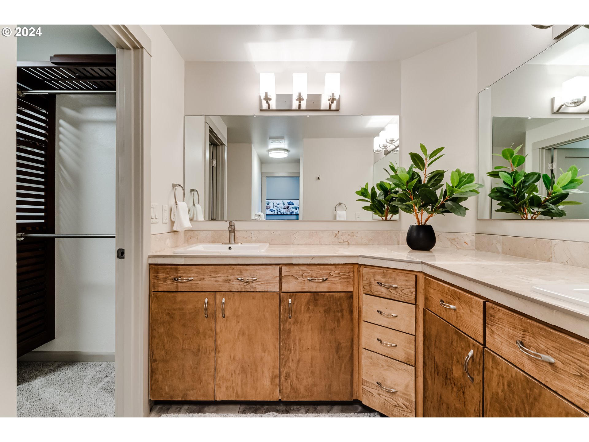 686 South 69th Place Springfield, OR 97478 - Photo 21 of 38 a view of a kitchen with a sink and chandelier
