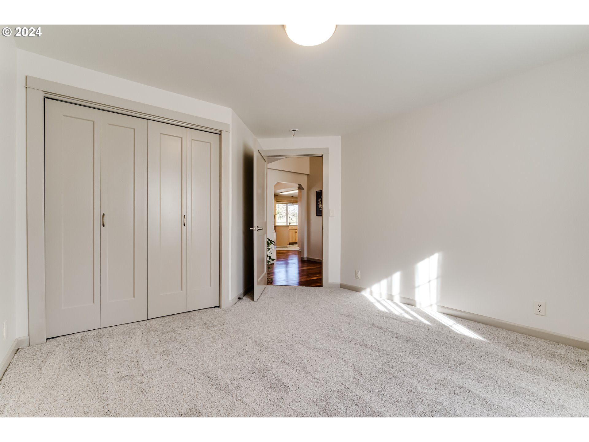 686 South 69th Place Springfield, OR 97478 - Photo 24 of 38 a view of empty room with wooden floor