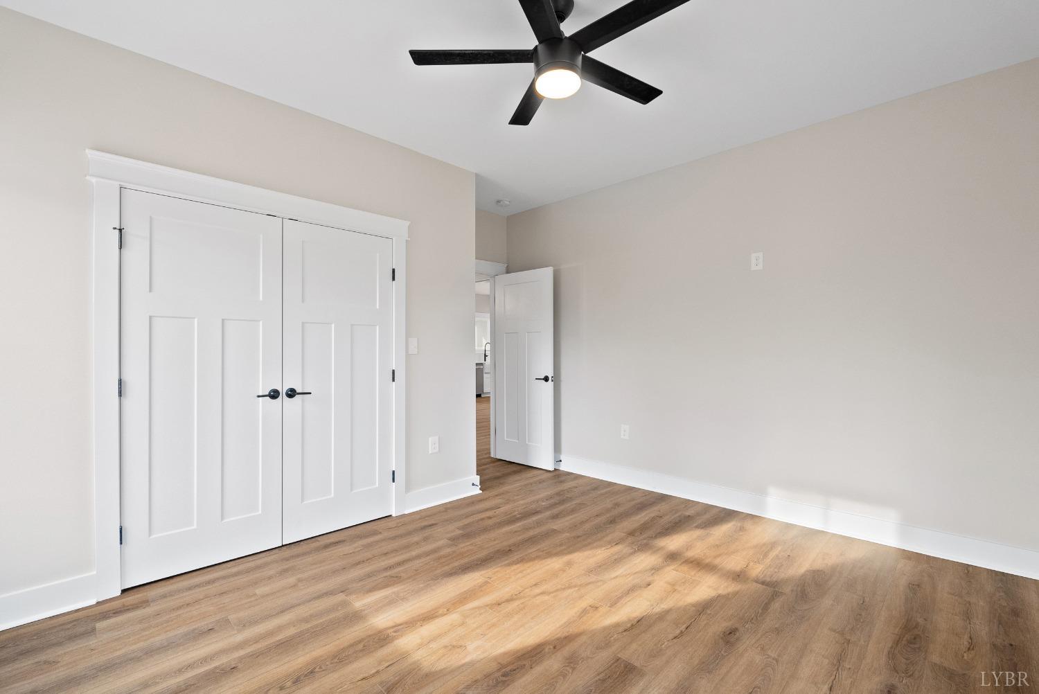 62 Burrell Drive Rustburg, VA 24588 - Photo 13 of 63 a view of a livingroom with wooden floor and closet area