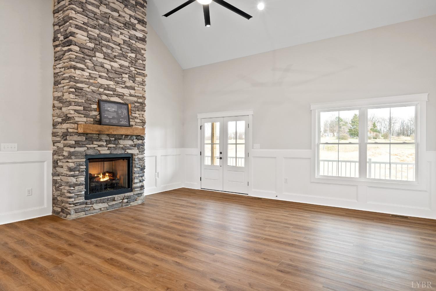 62 Burrell Drive Rustburg, VA 24588 - Photo 20 of 63 an empty room with windows and fireplace