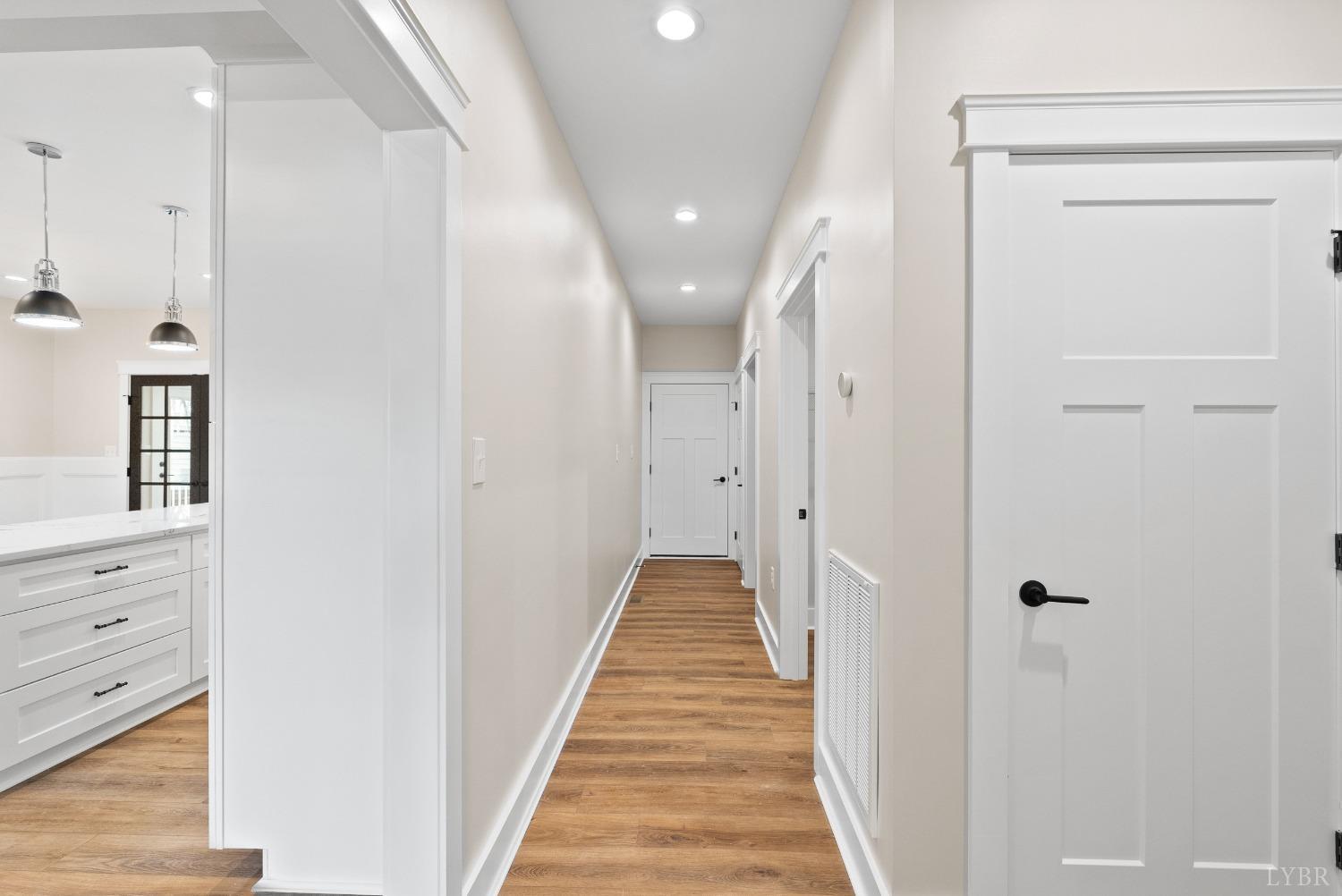 62 Burrell Drive Rustburg, VA 24588 - Photo 37 of 63 a view of a hallway with wooden floor and closet