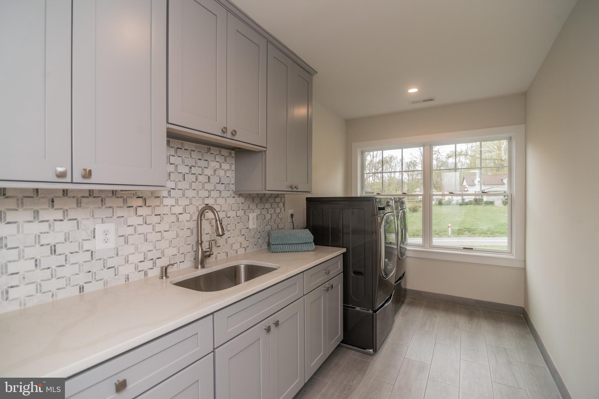 20900 Big Woods Road Dickerson, MD 20842 - Photo 28 of 40 Dedicated upper level laundry room with sink