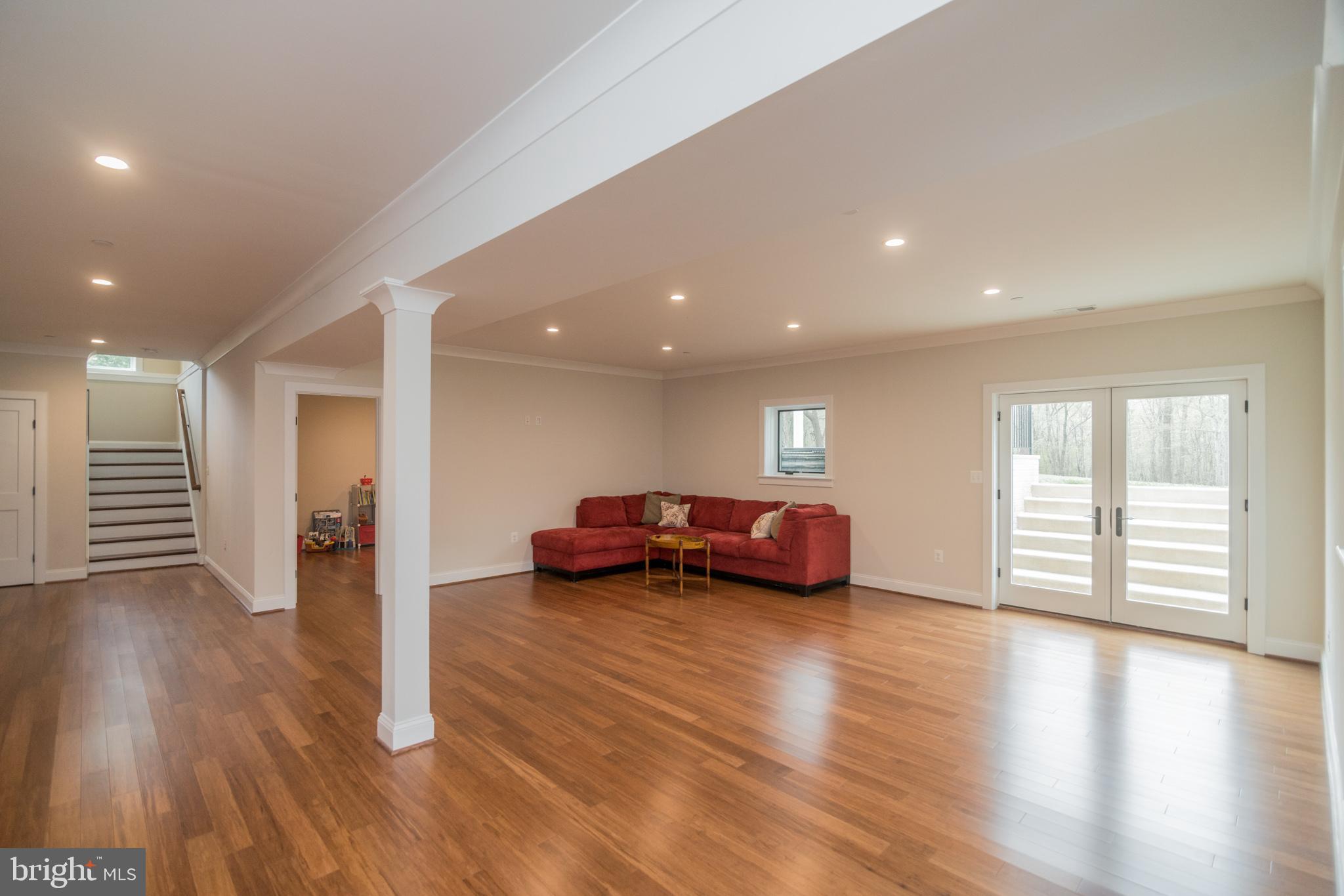 20900 Big Woods Road Dickerson, MD 20842 - Photo 29 of 40 Lower level rec room with hardwood