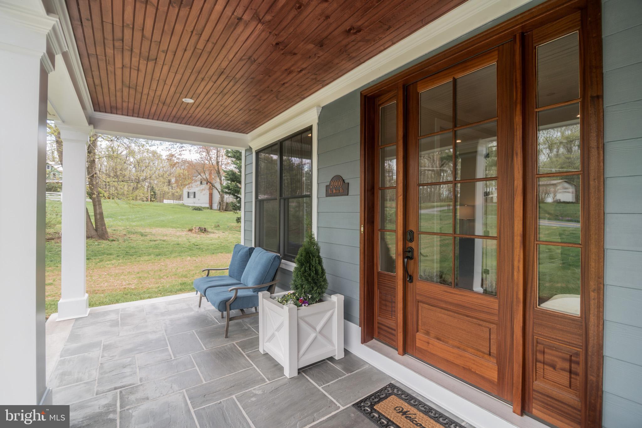 20900 Big Woods Road Dickerson, MD 20842 - Photo 5 of 40 Flag stone patio with Solid wood and glass door