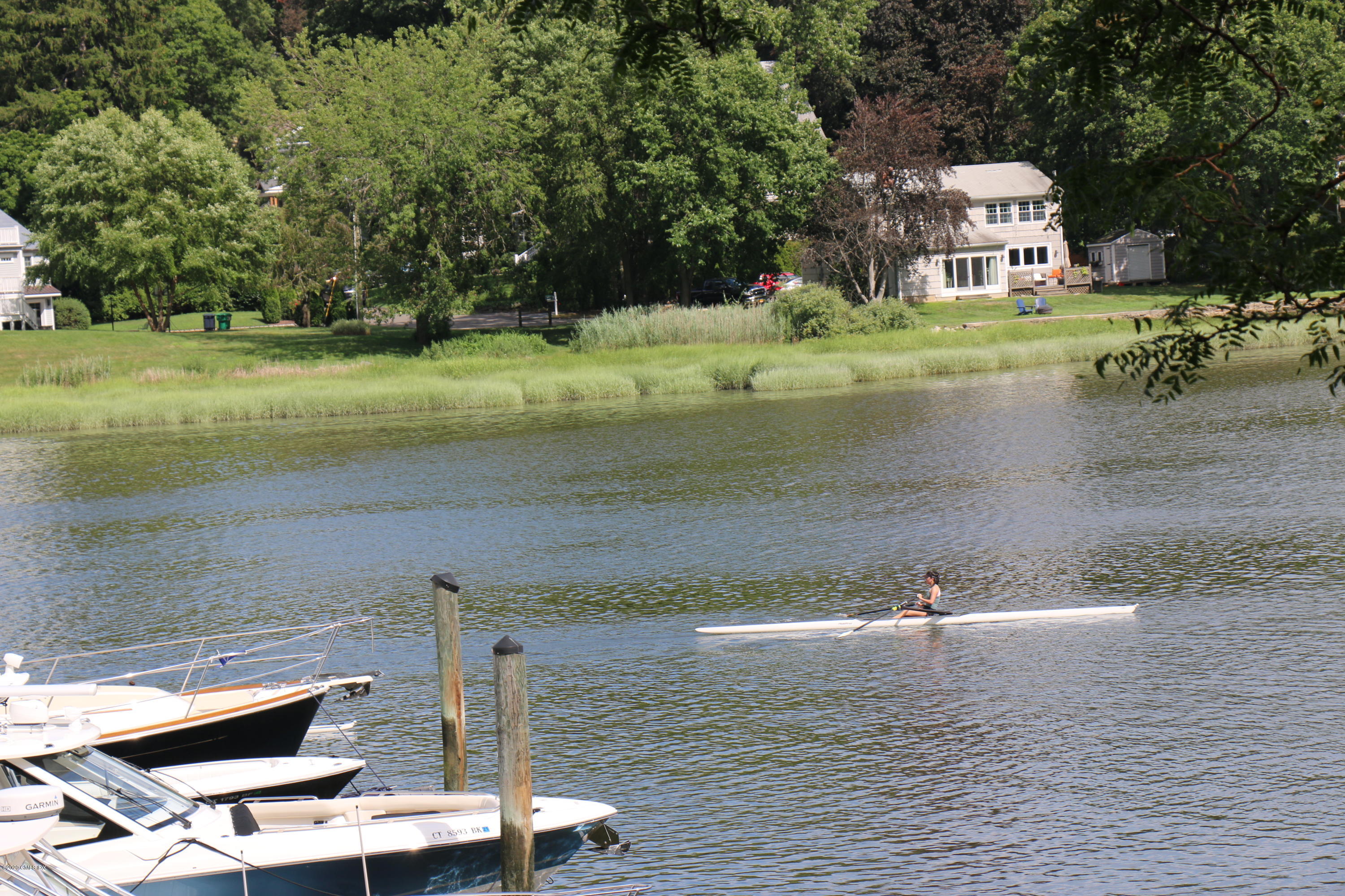 11 River Road, Unit 114 Cos Cob, CT 06807 - Photo 19 of 21 a view of a house with a yard