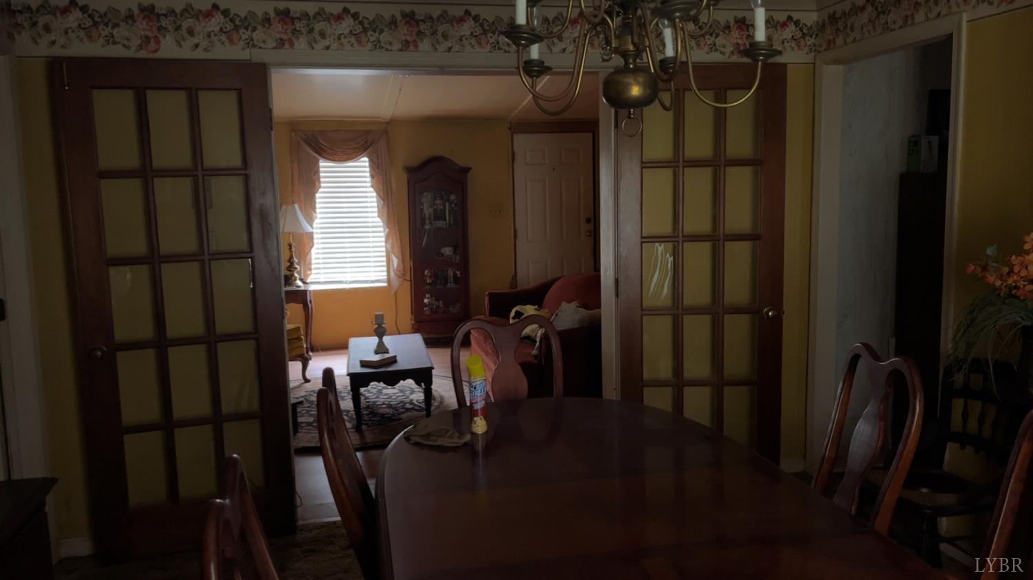 308 Randolph Street Phenix, VA 23959 - Photo 16 of 20 a view of entryway with wooden floor