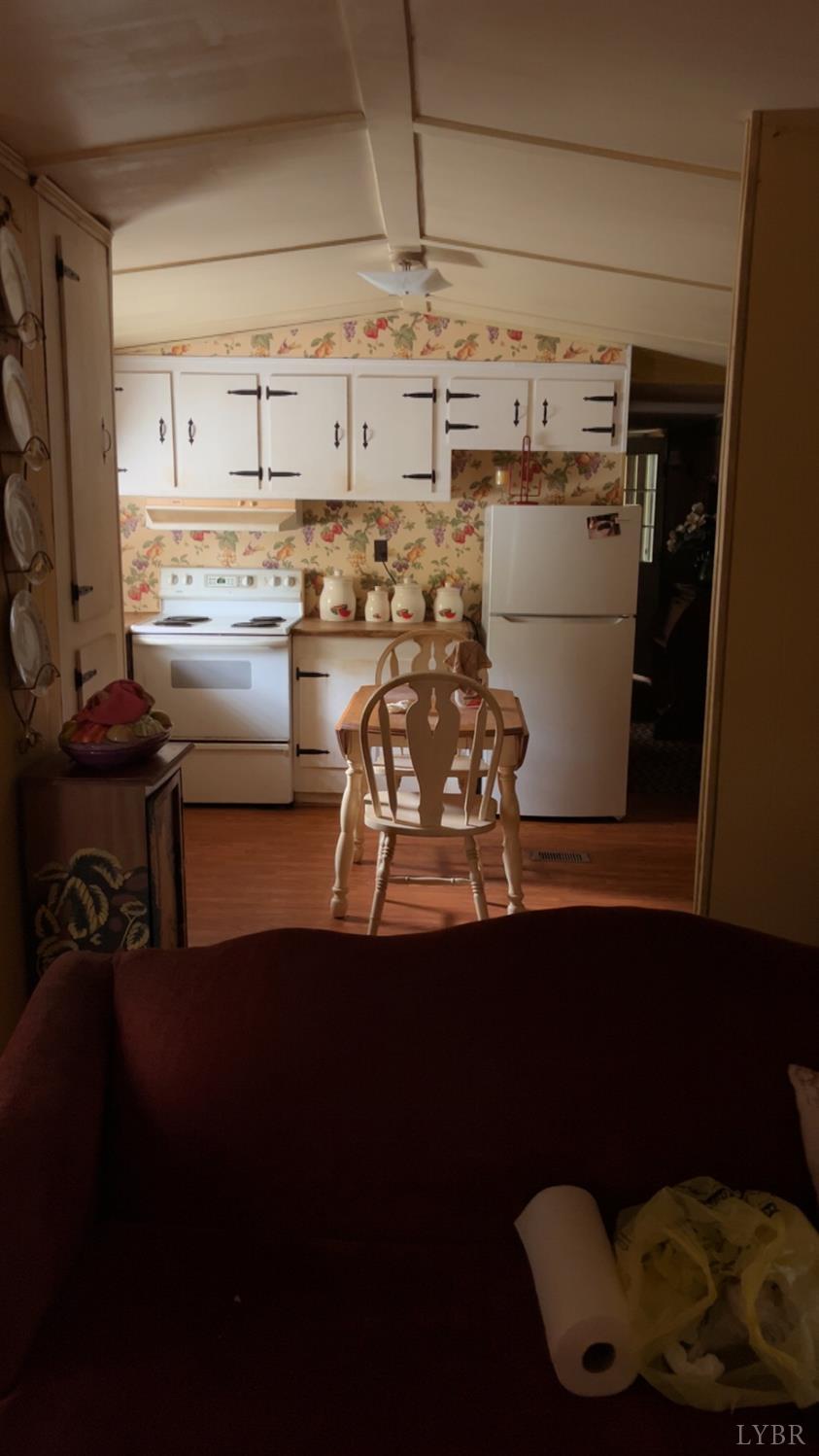 308 Randolph Street Phenix, VA 23959 - Photo 20 of 20 a kitchen with a sink and a stove top oven