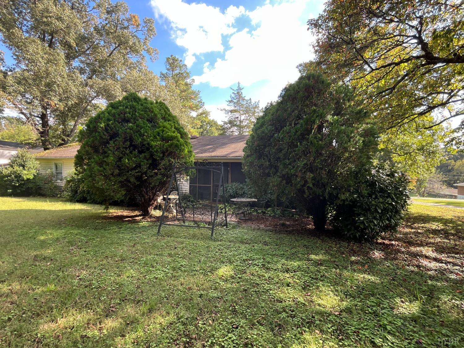 308 Randolph Street Phenix, VA 23959 - Photo 2 of 20 a view of a house with a yard and sitting area