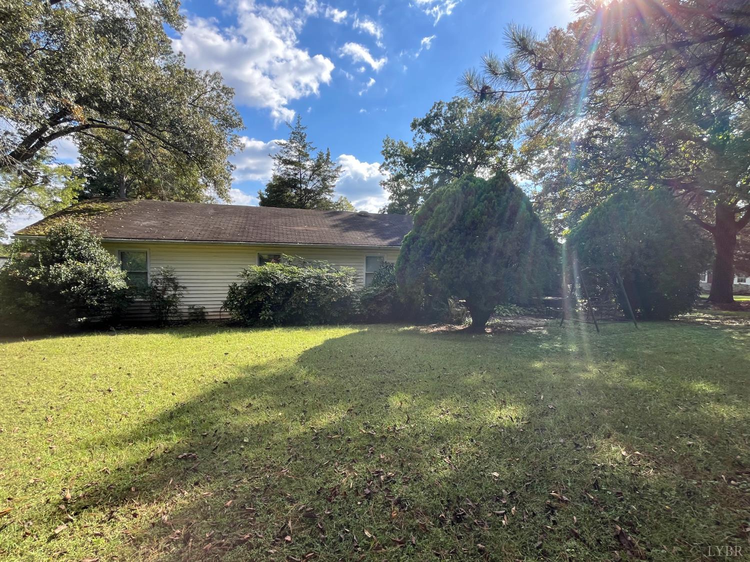 308 Randolph Street Phenix, VA 23959 - Photo 3 of 20 a view of a backyard