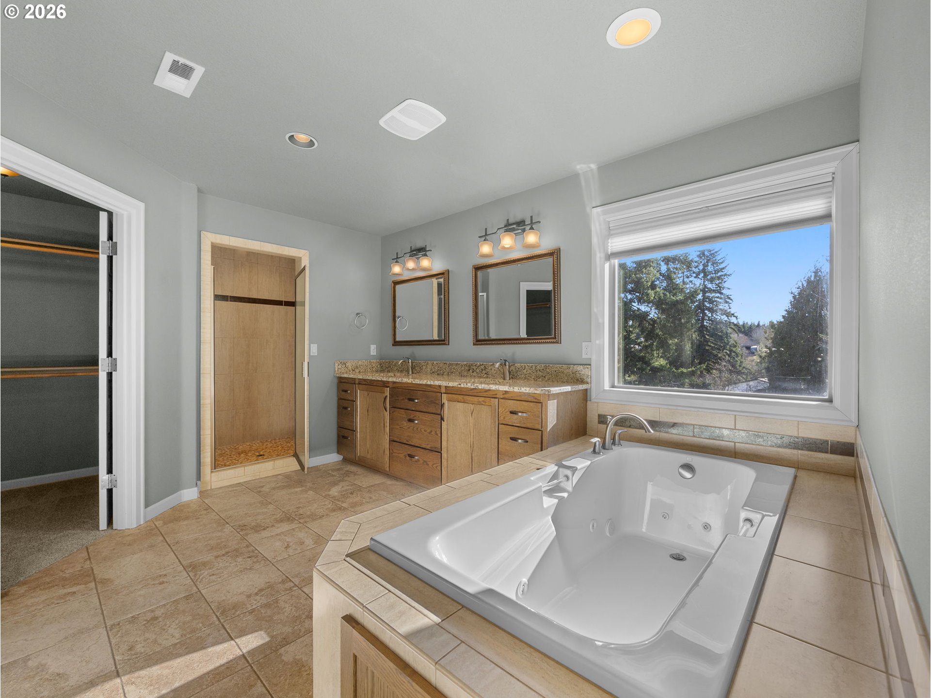 40192 Laurel Street Sandy, OR 97055 - Photo 22 of 37 a spacious bathroom with a tub sink and mirror
