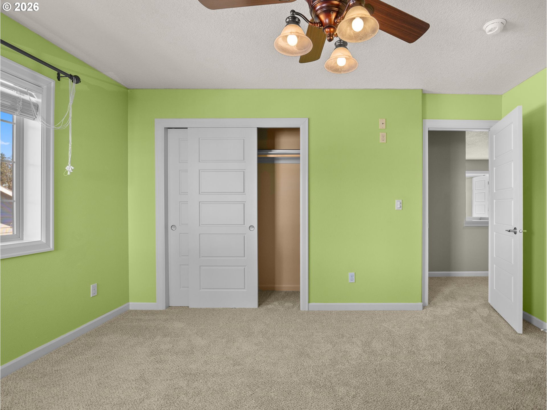 40192 Laurel Street Sandy, OR 97055 - Photo 25 of 37 an empty room with a fan & a window