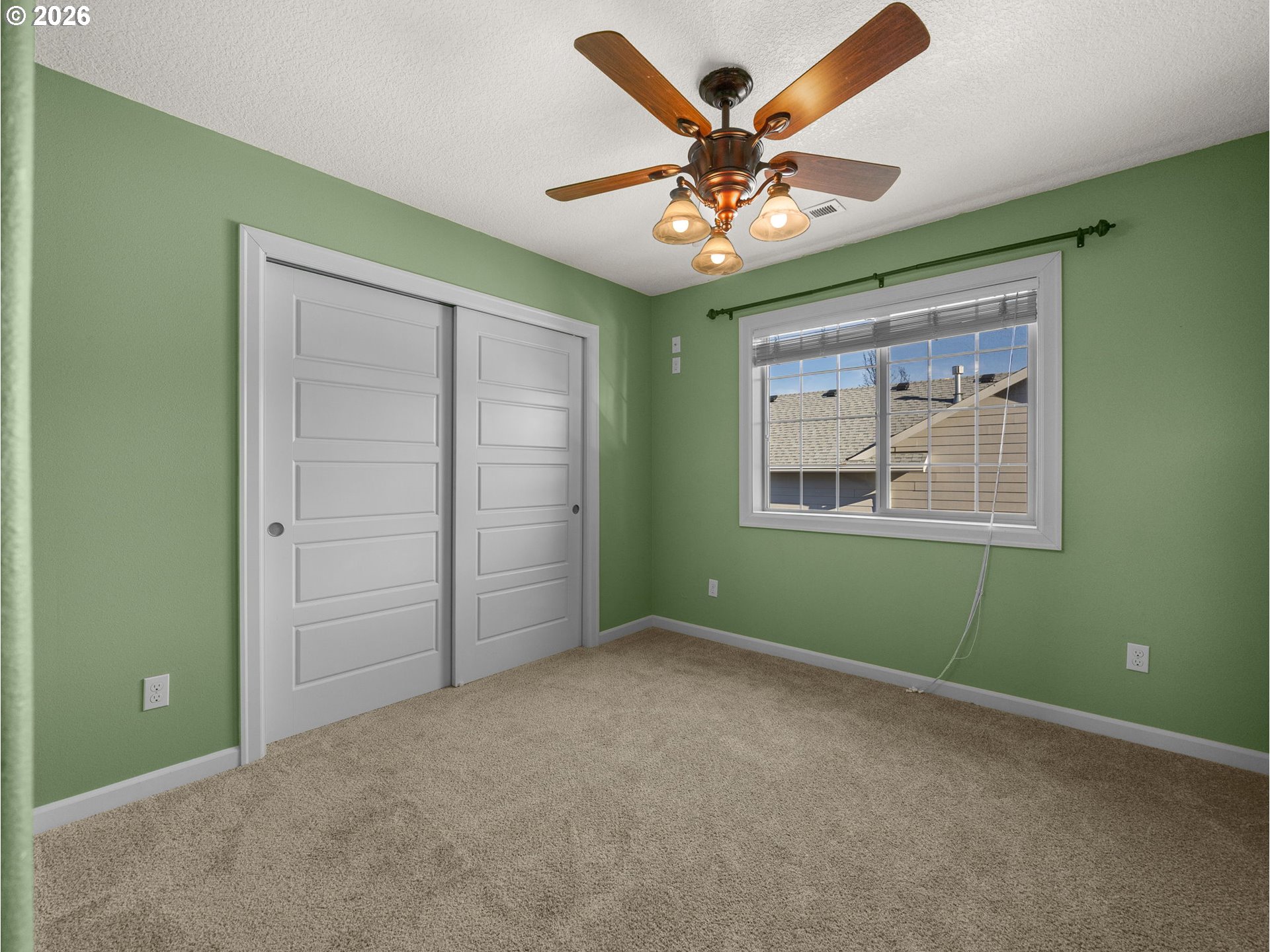 40192 Laurel Street Sandy, OR 97055 - Photo 28 of 37 an empty room with a window and ceiling fan