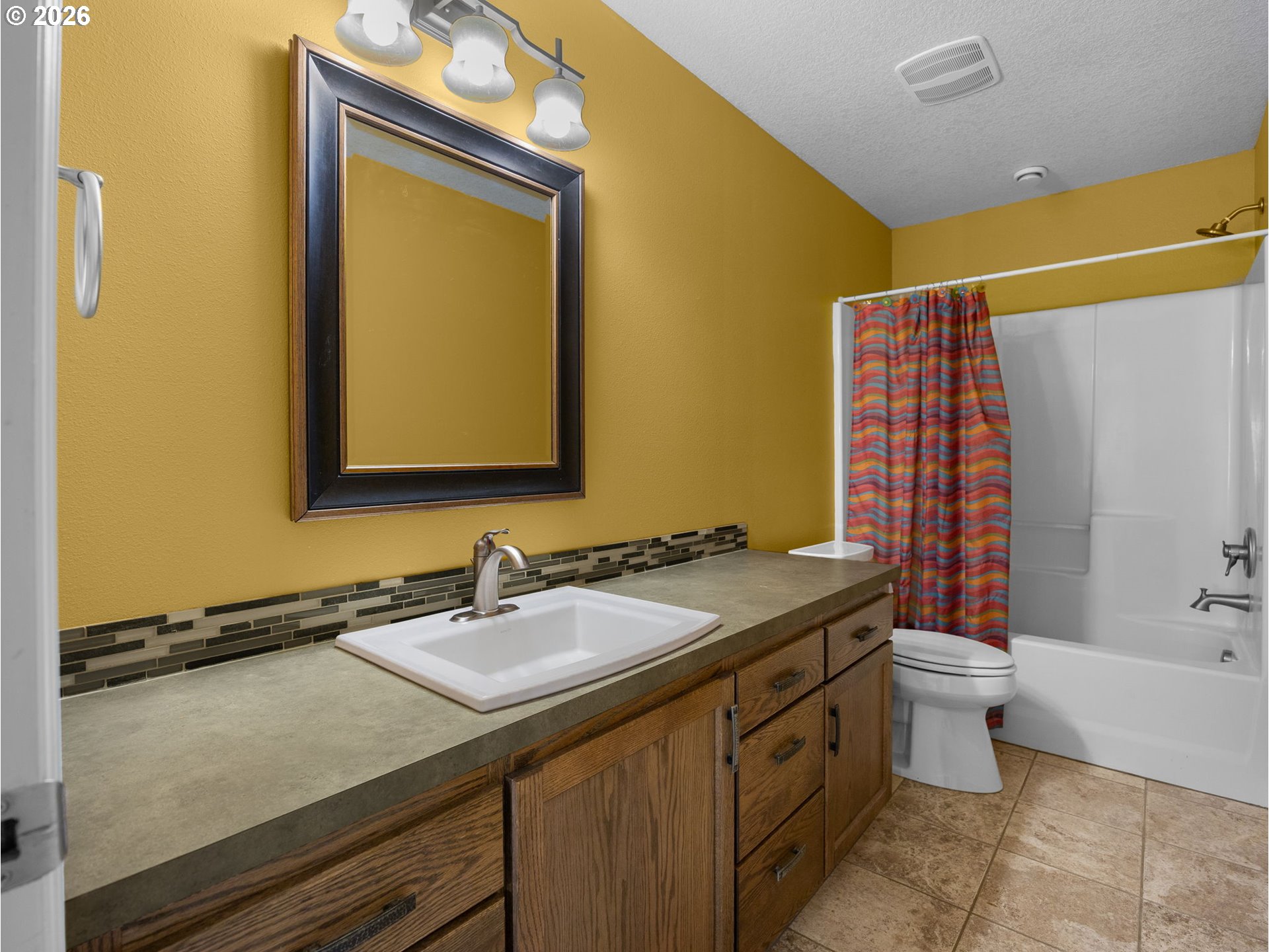 40192 Laurel Street Sandy, OR 97055 - Photo 31 of 37 a bathroom with a granite countertop sink toilet and shower