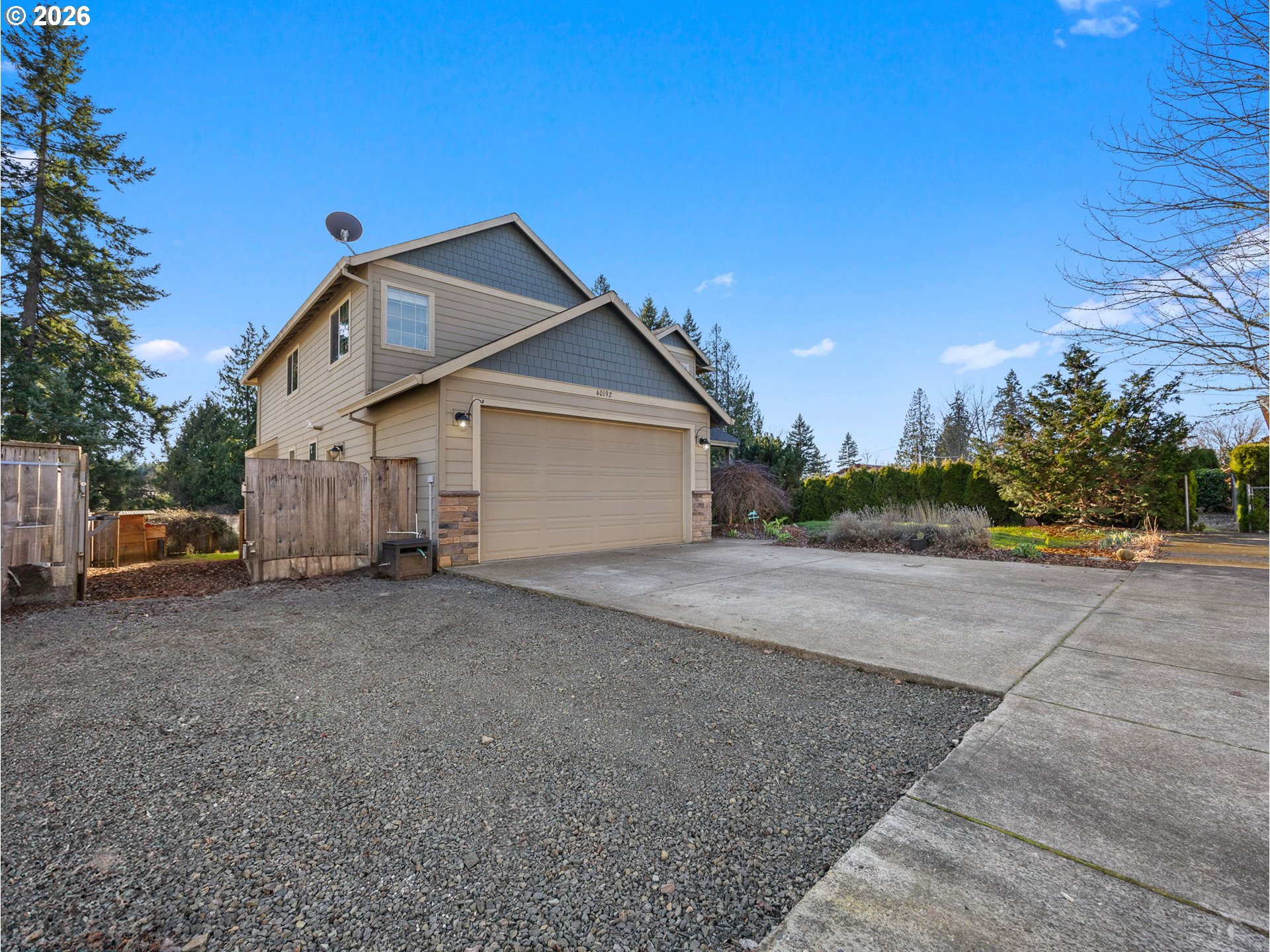 40192 Laurel Street Sandy, OR 97055 - Photo 36 of 37 a view of a house with a yard and garage