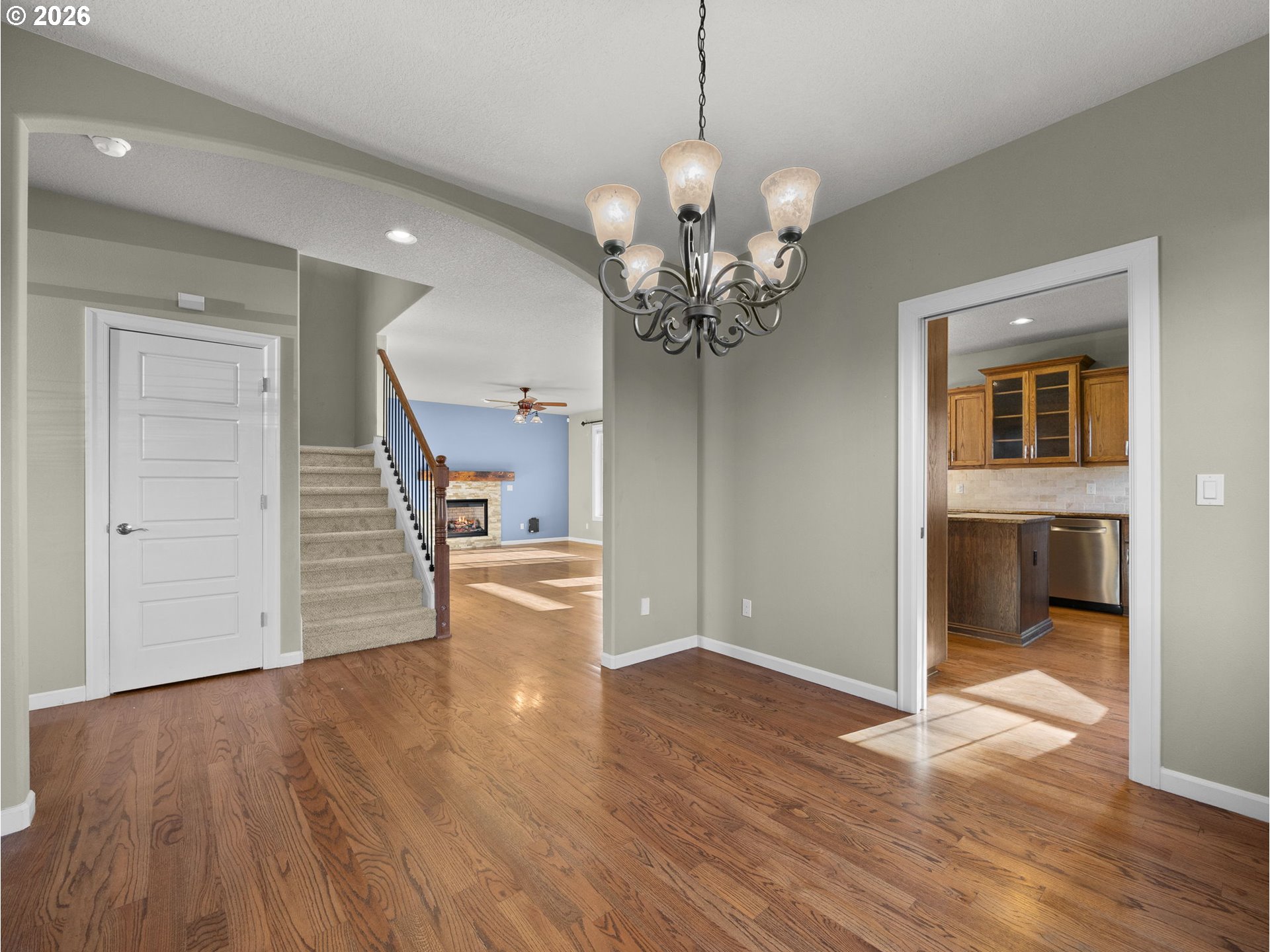 40192 Laurel Street Sandy, OR 97055 - Photo 5 of 37 a view of a livingroom with wooden floor and staircase