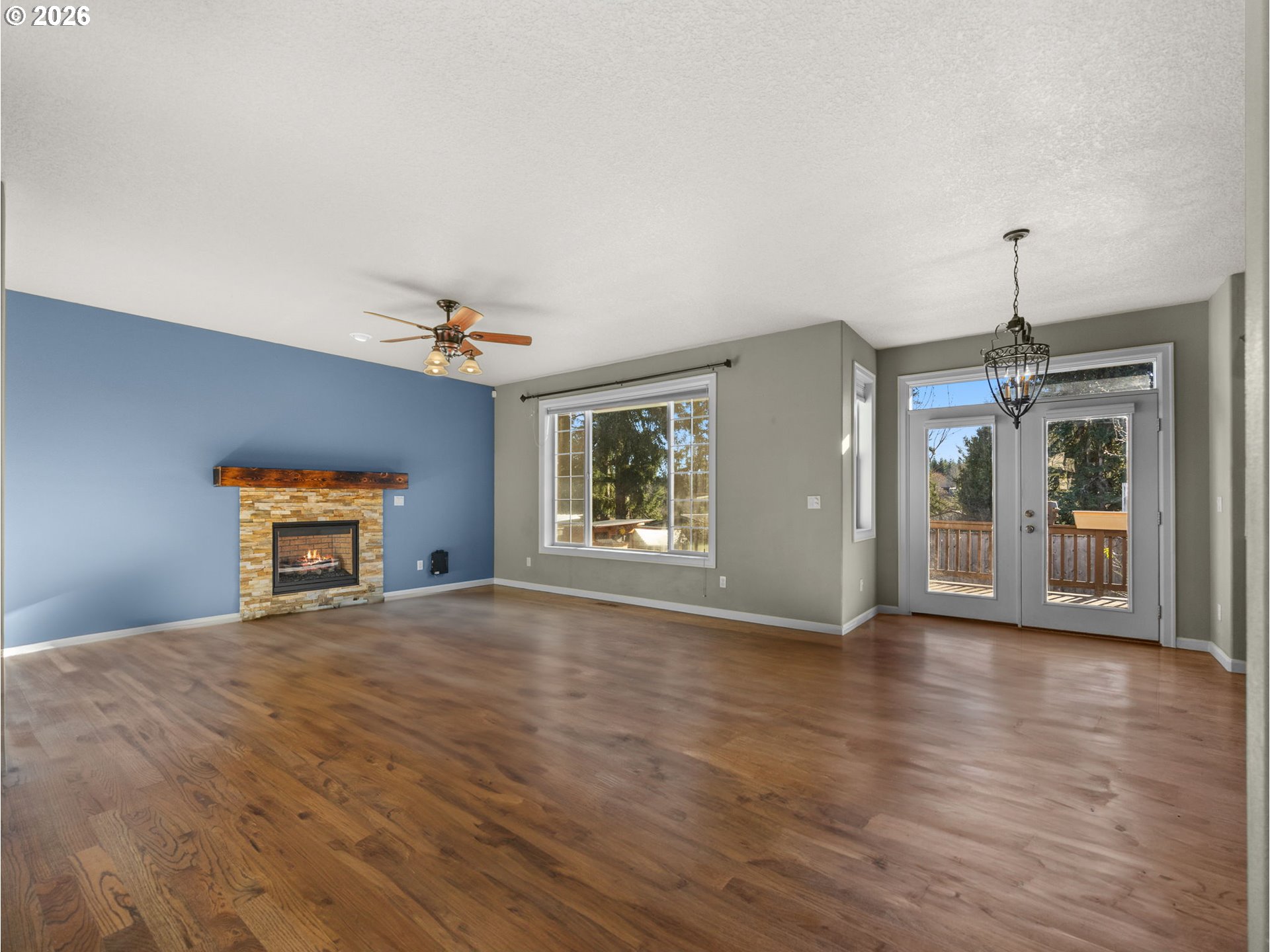 40192 Laurel Street Sandy, OR 97055 - Photo 7 of 37 a view of an empty room with window and wooden floor