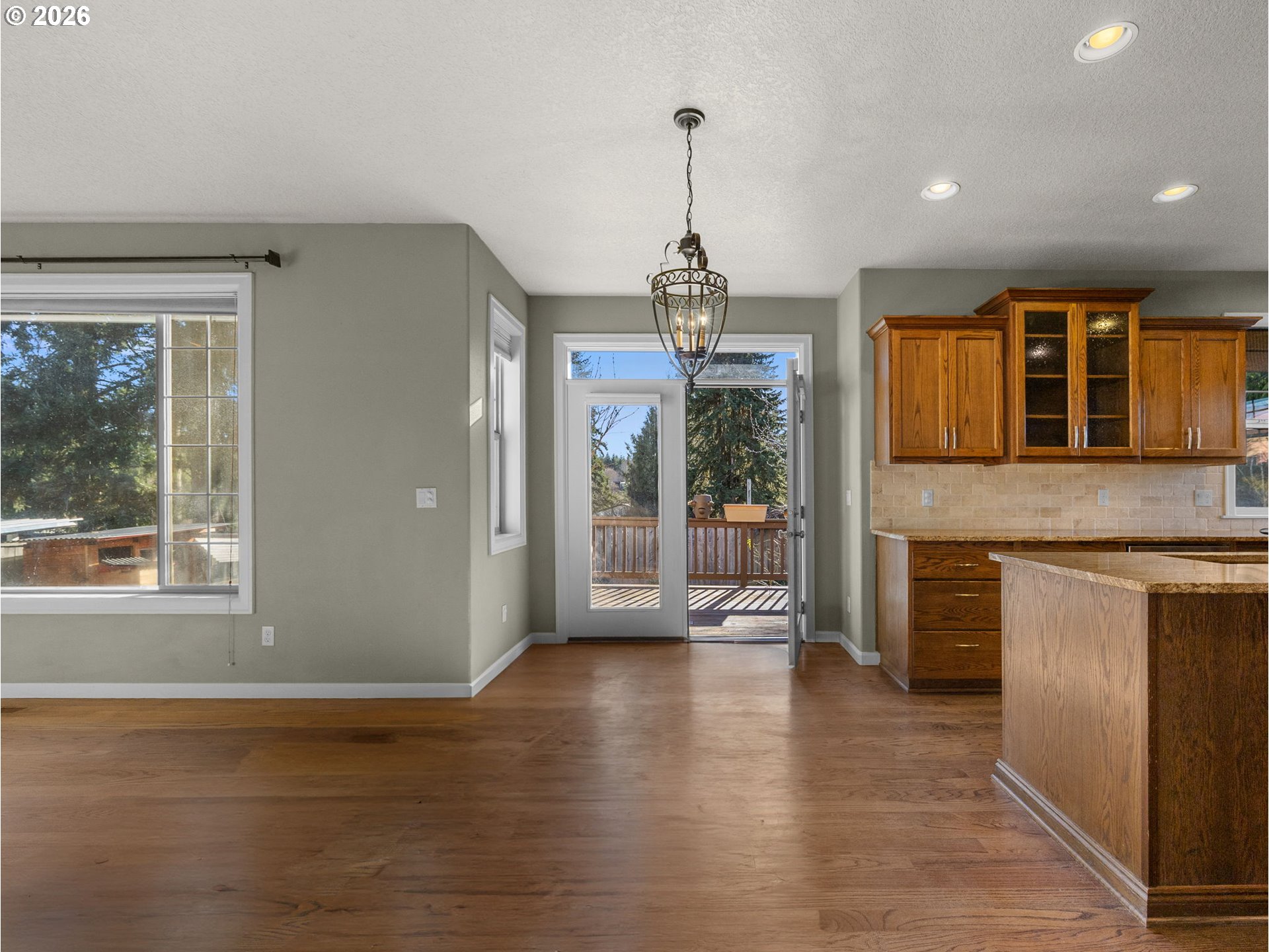 40192 Laurel Street Sandy, OR 97055 - Photo 8 of 37 a view of an empty room with window and wooden floor