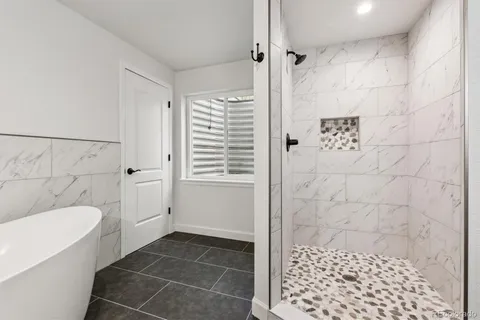 a bathroom with a sink and a shower