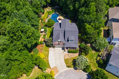 $975,000 | 212 Middlegreen Place, Holly Springs, NC 27540