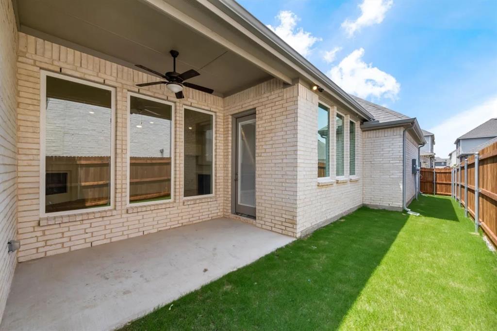 9337 Loggerhead Way Fort Worth, TX 76118 - Photo 38 of 40 a view of a porch with a yard