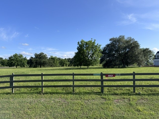 30934 Riverlake Road Fulshear, TX 77441 - Photo 8 of 21 a view of park with bench