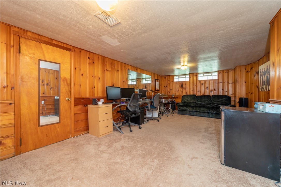 3586 Ingleside Road Beachwood, OH 44122 - Photo 18 of 22 The large pinewood paneled Recreation Room with glass block windows
