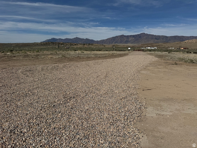 32 Sevier River, Unit 32 Levan, UT 84639 - Photo 34 of 50 Gravel driveway. View of mountain backdrop